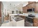 Modern kitchen with granite countertops, a stylish island, and stainless steel appliances perfect for cooking at 4321 Rolling Acres Rd, Charlotte, NC 28213
