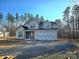 Charming two-story new construction featuring a covered front porch and a two-car garage at 44401 Us 52 N Hwy, Richfield, NC 28137