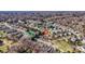 Home with in-ground pool near a pond nestled within a residential neighborhood at 5000 Tulip Ln, Matthews, NC 28104