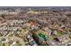 Aerial view of neighborhood with home, pool, pond and playground near the community at 5000 Tulip Ln, Matthews, NC 28104