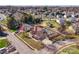 Beautiful brick home with mature trees, in-ground pool, playground, and well-maintained landscaping at 5000 Tulip Ln, Matthews, NC 28104