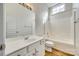 Bright bathroom featuring a shower-tub, vanity, large mirror, and vinyl flooring at 565 Sugar Tree Dr, Rock Hill, SC 29732