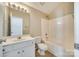 Bathroom with white shower-tub, sink vanity, and tiled floors at 565 Sugar Tree Dr, Rock Hill, SC 29732