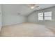 Bonus room featuring neutral walls, carpet, and natural light at 565 Sugar Tree Dr, Rock Hill, SC 29732