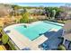 Overhead view of a large community pool with ample seating and a backdrop of lush greenery at 565 Sugar Tree Dr, Rock Hill, SC 29732