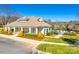 Community pool area featuring a clubhouse with a pool and well-maintained landscaping at 565 Sugar Tree Dr, Rock Hill, SC 29732