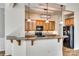 Functional kitchen with bar seating, pendant lighting, and black appliances at 565 Sugar Tree Dr, Rock Hill, SC 29732