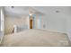 Spacious loft with neutral walls, carpet, and natural light at 565 Sugar Tree Dr, Rock Hill, SC 29732