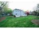 Expansive backyard showcasing a lush lawn and a delightful pergola at 5925 Carmel Station Ave, Charlotte, NC 28226