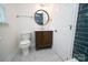 Renovated bathroom features updated vanity, fixtures, and tile accents at 5925 Carmel Station Ave, Charlotte, NC 28226
