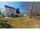 Expansive backyard featuring a patio with an outdoor dining area at 7001 Conifer Cir, Indian Trail, NC 28079