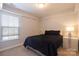 Bedroom featuring a bed and a window at 7001 Conifer Cir, Indian Trail, NC 28079