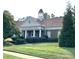 Lake Park Community Center with well maintained landscaping at 7001 Conifer Cir, Indian Trail, NC 28079