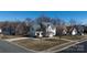 Exterior aerial view of a two-story home, showcasing a well-maintained lawn at 7001 Conifer Cir, Indian Trail, NC 28079