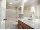 Bathroom featuring a shower-tub combination and a single sink vanity with storage at 7037 Ladys Secret Dr, Indian Trail, NC 28079