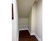 Attic closet area features shelving and hardwood floors at 822 Wisteria Way, Salisbury, NC 28146