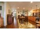 Spacious living room with seamless flow, hardwood floors, and an inviting atmosphere for gatherings and relaxation at 822 Wisteria Way, Salisbury, NC 28146