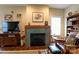 Comfortable living room featuring a fireplace and a mix of modern and traditional decor at 822 Wisteria Way, Salisbury, NC 28146