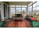 Charming sunroom filled with natural light, a comfortable seating area, and large windows at 822 Wisteria Way, Salisbury, NC 28146