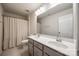 Bathroom featuring a double sink vanity and shower-tub combo at 844 Braddock Way, Fort Mill, SC 29715