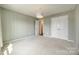 Bedroom featuring neutral walls and plush carpeting with a double closet at 844 Braddock Way, Fort Mill, SC 29715
