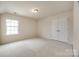 A standard bedroom featuring light-colored walls and plush carpeting at 844 Braddock Way, Fort Mill, SC 29715