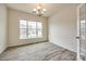 Bright dining room featuring wood-look flooring and natural light from large windows at 844 Braddock Way, Fort Mill, SC 29715