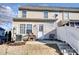 Enclosed backyard featuring an air conditioning unit, privacy fence, and outdoor seating area at 9741 Turning Wheel Dr, Charlotte, NC 28214