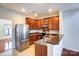 Well-lit kitchen features stainless steel appliances and sleek countertops at 9741 Turning Wheel Dr, Charlotte, NC 28214