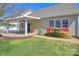 Backyard featuring a covered patio with well-maintained landscaping at 1012 Equipoise Dr, Indian Trail, NC 28079