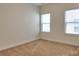 Cozy bedroom featuring carpet flooring and neutral colored walls at 1012 Equipoise Dr, Indian Trail, NC 28079