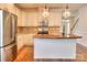 Traditional kitchen with stainless steel appliances, wooden island countertop, and decorative pendant lighting at 1012 Equipoise Dr, Indian Trail, NC 28079
