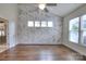 Spacious main bedroom offering vaulted ceilings, natural light, and an elegant accent wall at 1012 Equipoise Dr, Indian Trail, NC 28079