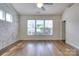 Bright main bedroom with windows offering plenty of natural light and views of the neighborhood at 1012 Equipoise Dr, Indian Trail, NC 28079