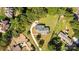 Stunning aerial view of a home with lush greenery, a long driveway, and multiple parking spaces at 1131 Doby Ct, Fort Mill, SC 29715