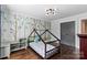 bedroom features tree wallpaper, a full bed, wood floors and natural light at 1131 Doby Ct, Fort Mill, SC 29715