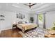 Cozy bedroom featuring a tray ceiling, a neutral color scheme and natural light at 1131 Doby Ct, Fort Mill, SC 29715