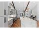 Modern kitchen featuring stainless steel appliances, a large island, and ample storage space with gray cabinetry at 1131 Doby Ct, Fort Mill, SC 29715