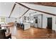 Bright, open kitchen area with large island, stainless steel appliances, and adjacent dining area at 1131 Doby Ct, Fort Mill, SC 29715