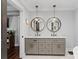 Bathroom features double sinks, granite countertops, pendant lighting and modern fixtures at 1131 Doby Ct, Fort Mill, SC 29715