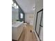 Stylish bathroom with a tub, a shower, and wood-look floors at 1170 Meadowcreek Dr, China Grove, NC 28023