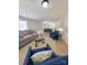 Inviting living space with plush sofas, stylish decor, and an open concept layout connecting to the kitchen and dining areas at 1170 Meadowcreek Dr, China Grove, NC 28023