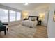 Serene bedroom retreat featuring natural light, a comfortable bed, and minimalist décor at 1170 Meadowcreek Dr, China Grove, NC 28023