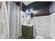 Nicely appointed bathroom features modern vanity and shower with white paneling at 1335 Blacksnake Rd, Stanley, NC 28164