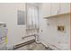 A utility room featuring a water heater, window and electrical panel at 136 Coble Ave, Albemarle, NC 28001
