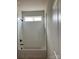 Clean, bright bathroom with white subway tile shower and tub combination, black fixtures at 140 First St, Huntersville, NC 28078