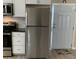 Updated kitchen with modern stainless steel appliances, light wood floors, and white cabinets at 150 Twisted Oak Ln, Gastonia, NC 28052