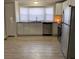 Bright kitchen with stainless steel appliances, granite counters, and ample storage space at 150 Twisted Oak Ln, Gastonia, NC 28052