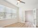 Bright home office with open doors to closet and large window at 15119 Oleander Dr, Charlotte, NC 28278