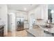 Bright kitchen featuring stainless steel appliances, granite counters, and a spacious layout at 15119 Oleander Dr, Charlotte, NC 28278